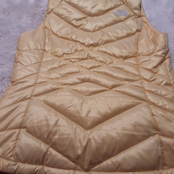 The North Face 550 down Vest.  Size small, yellow color - Picture 2 of 6
